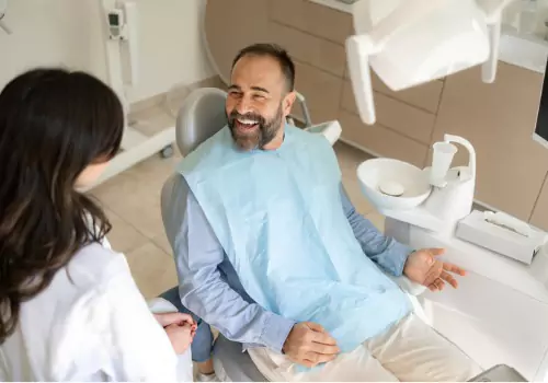 A happy man ready to have his teeth worked on by the Best Dentists near Dunlap IL