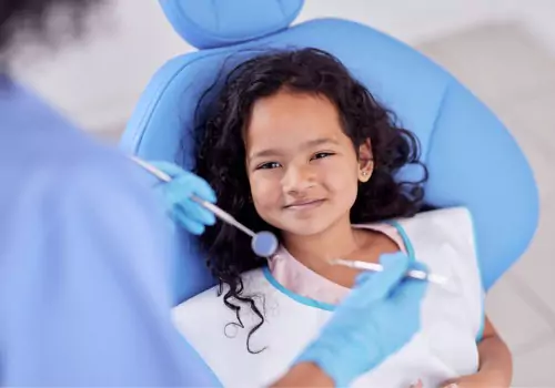 A child ready to have her teeth cleaned by the Best Dentists in Dunlap IL