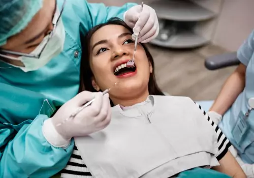 Dentists in Dunlap IL performing oral surgery