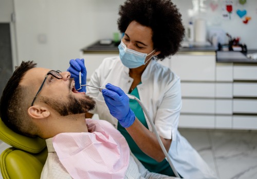 A dental procedure is seen in progress. The Smile Center is a dentist's office in Peoria IL.